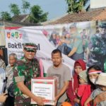 Peringati HUT RI Ke-78, Kodim 0735/Surakarta Gelar Baksos Pemberian Bantuan Paket Sembako Dan Penanaman Bibit Pohon